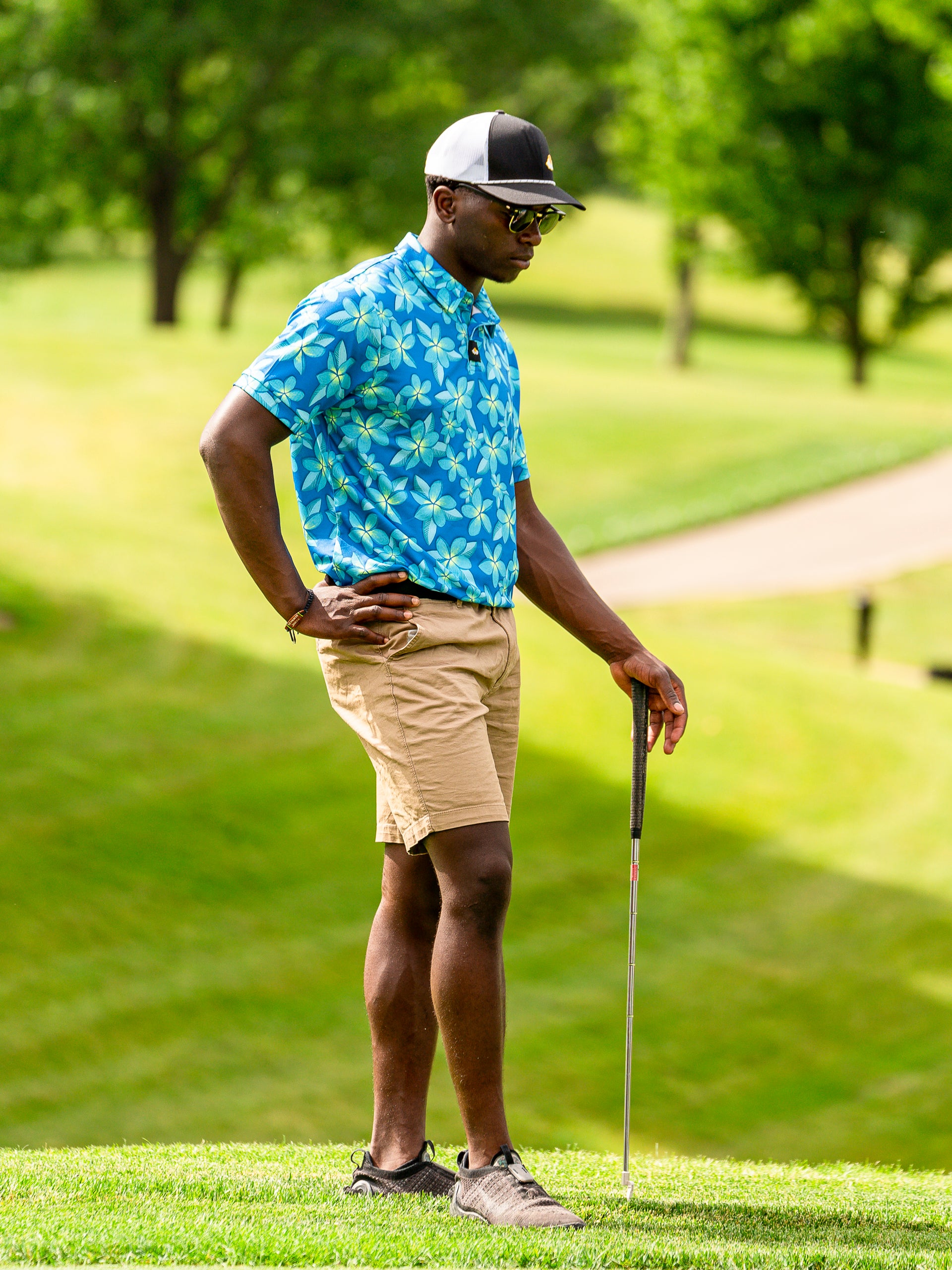 Golfer wearing Lei Up